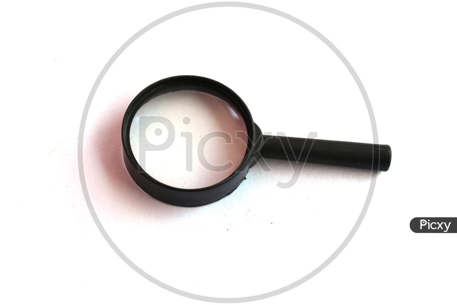 Close Up Single Magnifying Glass With Black Handle