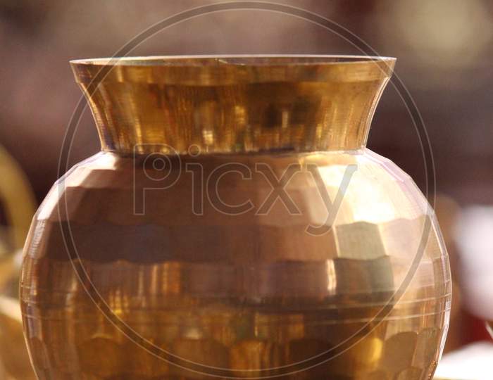 Golden Pot On A Table