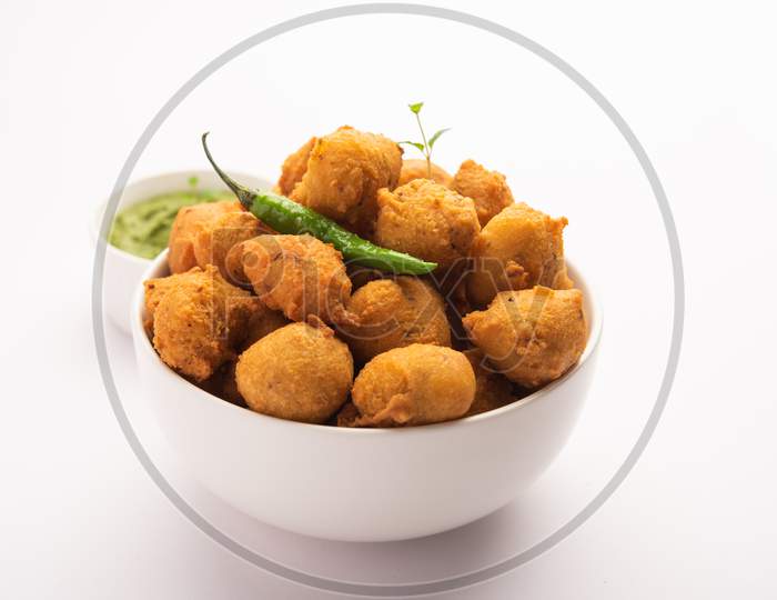 Indian Tasty Moong Dal Vada, Pakora, Bhajiya, Yellow Split Gram Fritters Served With Green Chutney