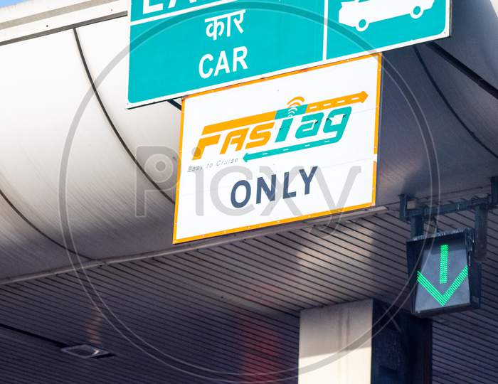 Fast Tag Sign Near A Toll Booth Showing The New Cashless Rfid Based Fastag Payment System Made Mandatory By The National Highway Authority Of India Nhai To Speed Payments And Reduce Congestion On Highways