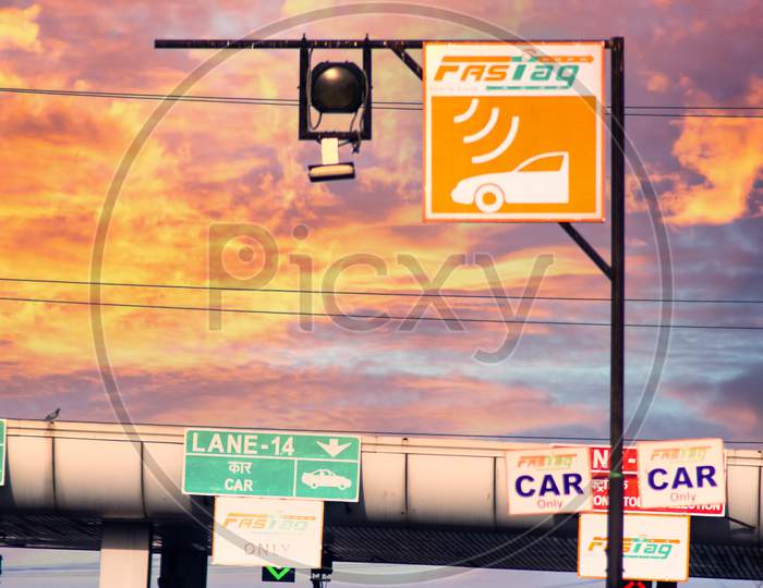Fast Tag Sign Near A Toll Booth Showing The New Cashless Rfid Based Fastag Payment System Made Mandatory By The National Highway Authority Of India Nhai To Speed Payments And Reduce Congestion On Highways