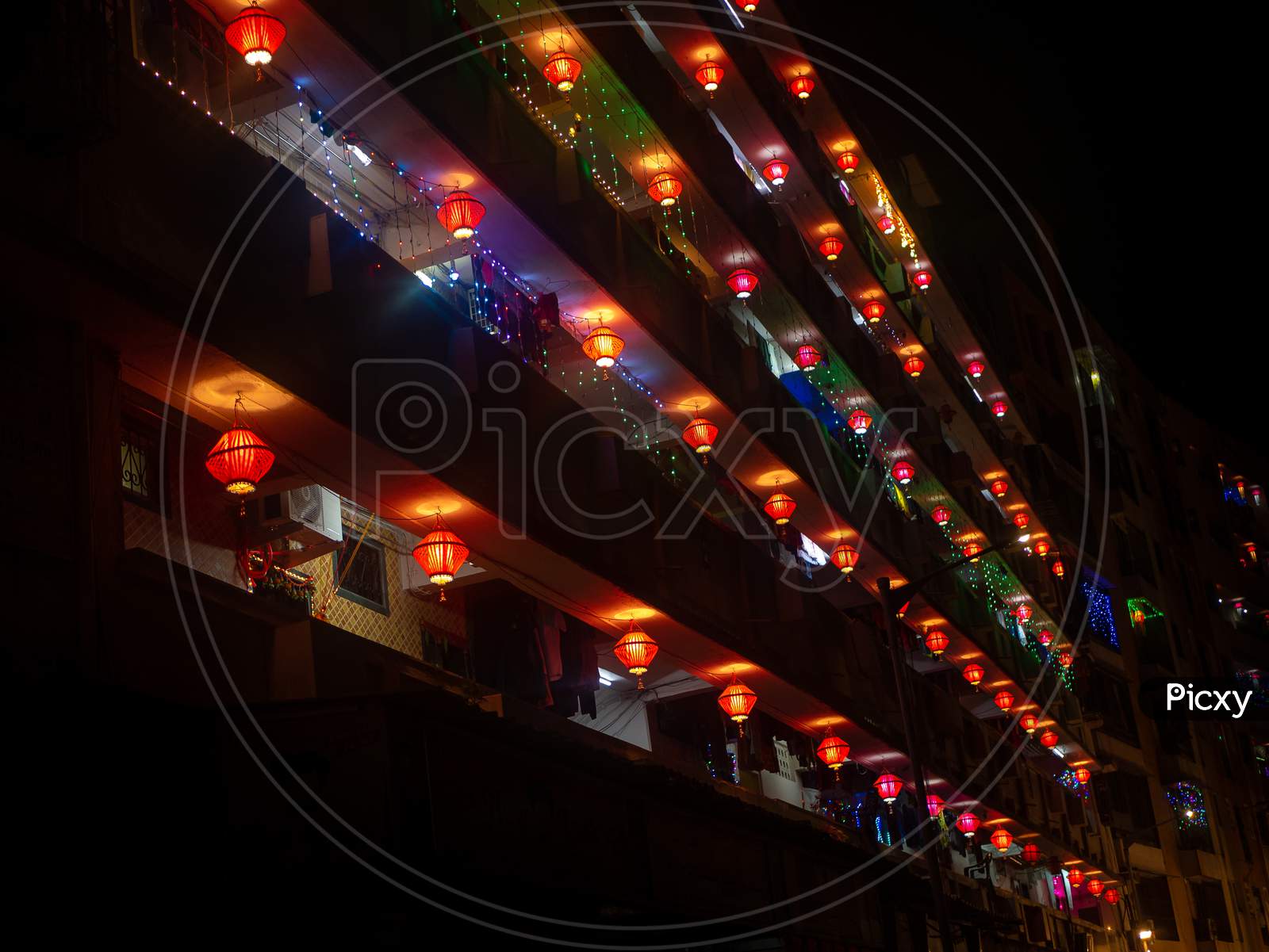 Colorful  Lantern Lights Hanging Outside Houses On The Occassion Of Diwali