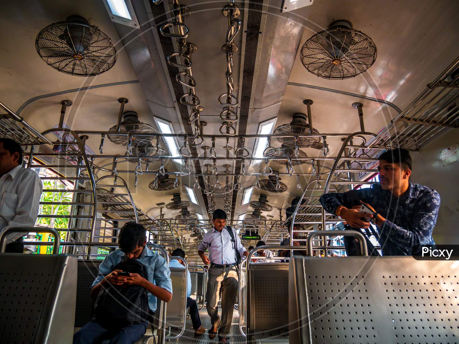 Unidentified Passengers Inside Indian Railway Local Train On Westerna Railway Line