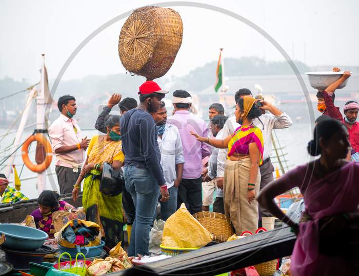 Unidentified Women And Men Trade In A Wide Variety Of Fish At One Of The Oldest Fish Market In Mumbai Called Bhaucha Dhakka