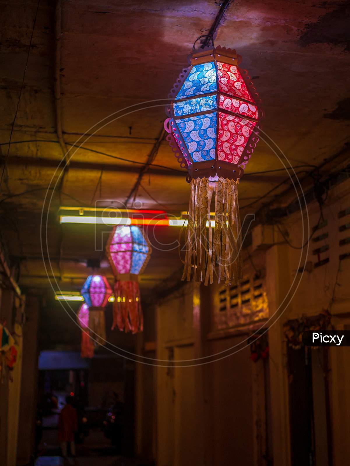 Colorful Lantern Lights Hanging Outside Houses On The Occassion Of Diwali