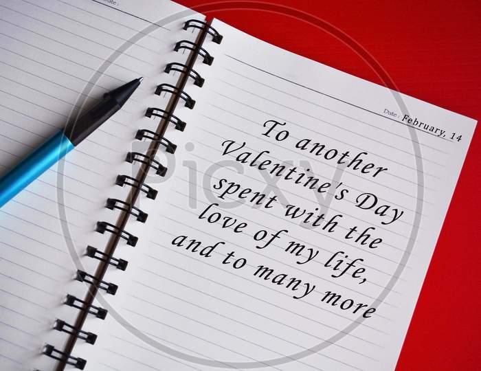 Text On White Notepad With Red Background. Top View And Valentine'S Day Concept.