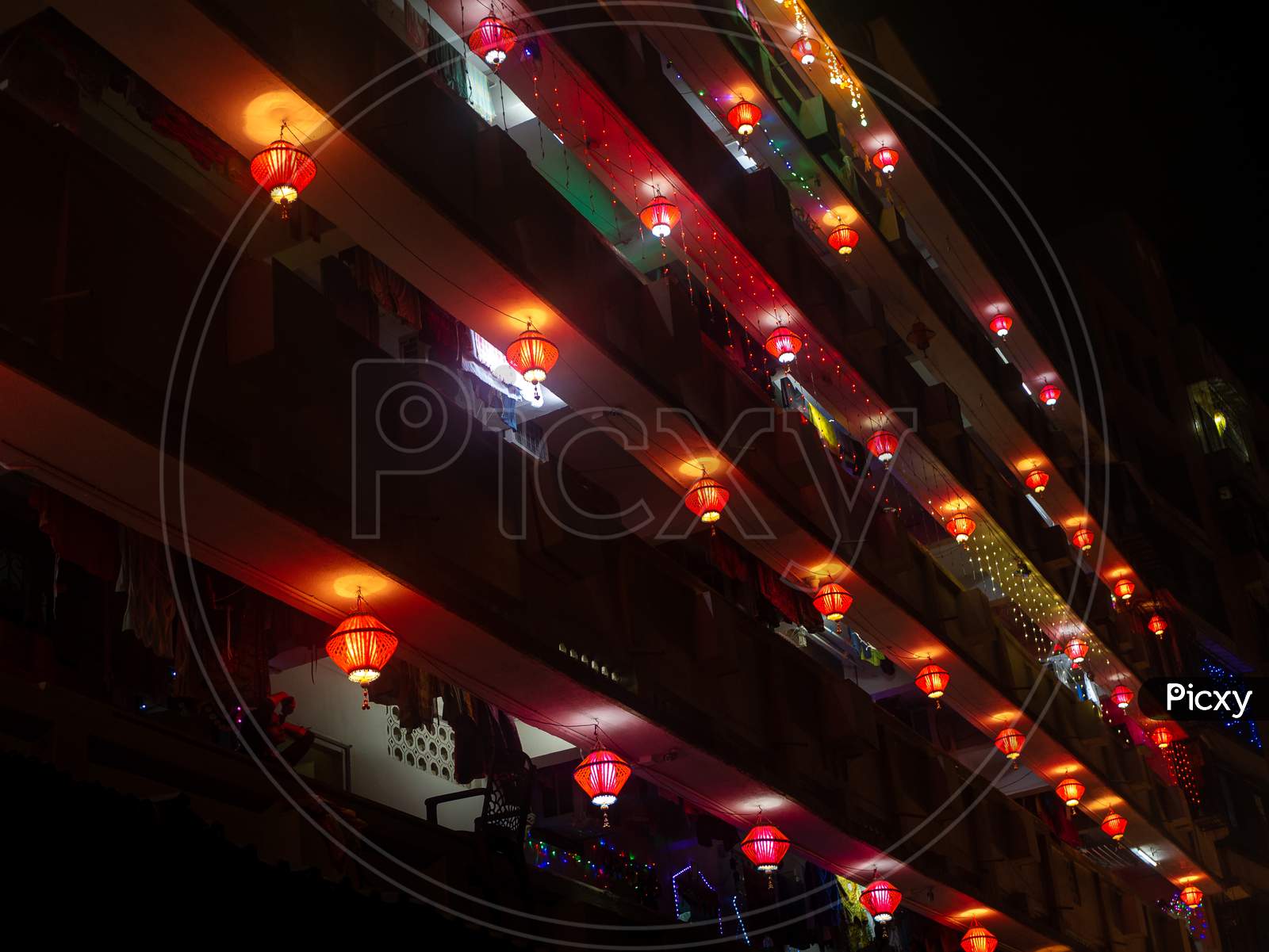 Colorful Akash Kandil / Lantern Lights Hanging Outside Houses On The Occassion Of Diwali