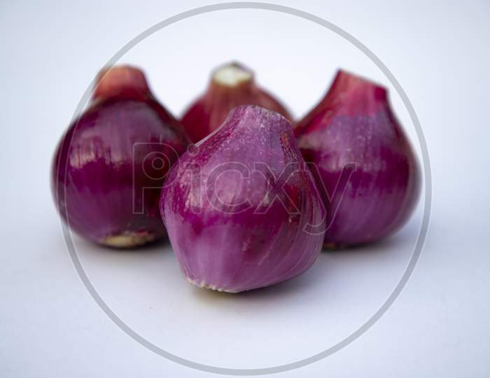 Red onion isolated on white background. close-up photoshoot