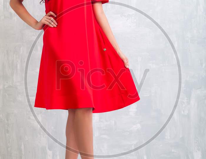 Blonde In Red Fashionable Dress