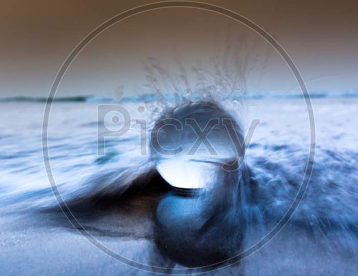 Waves in action with Lensball