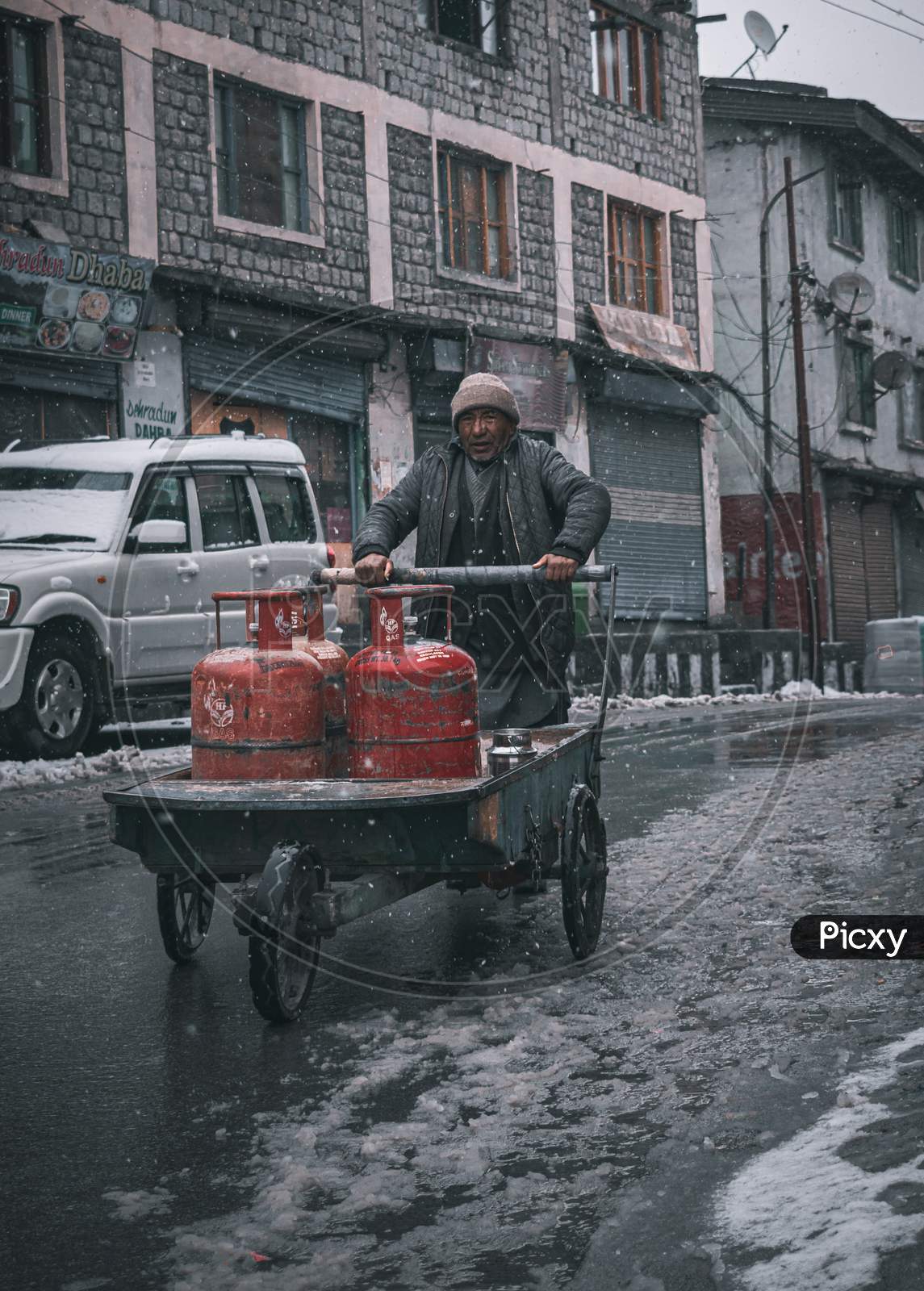 Image of old man hard work-AX227450-Picxy