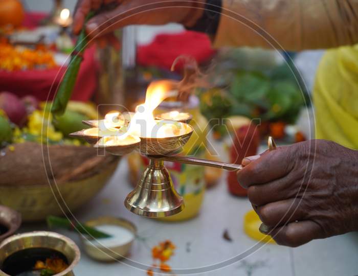 Oil Brass Lamp Lit For Worship In Puja-Arati