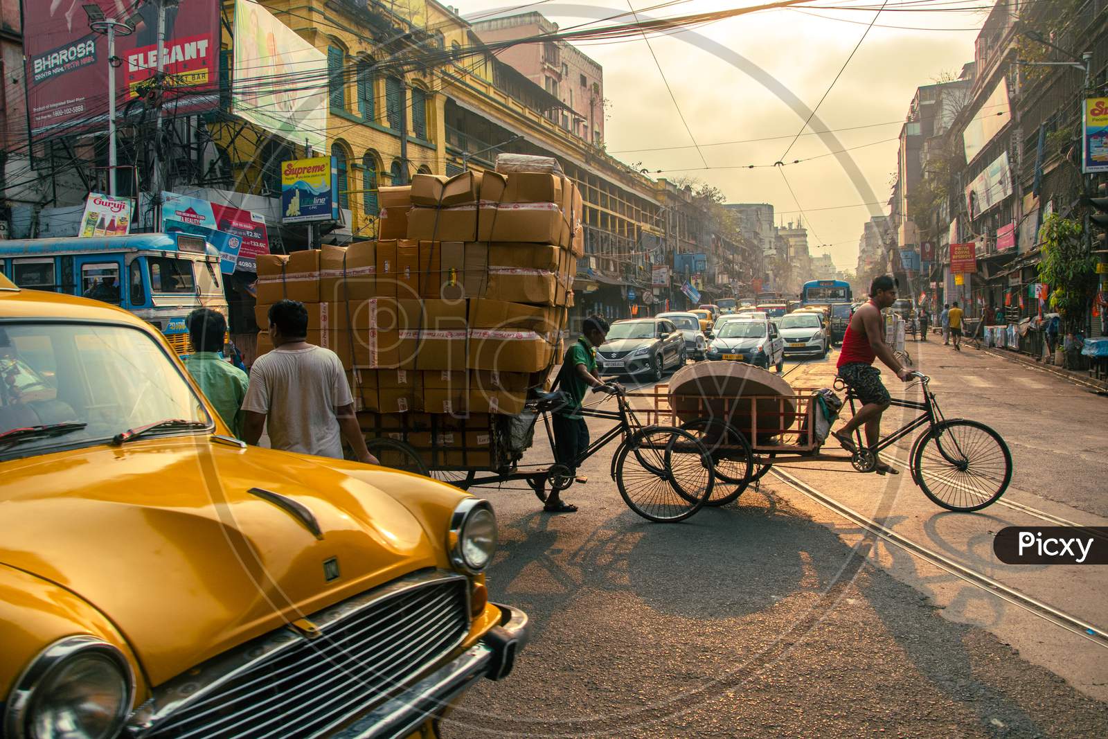 YELLOW TAXIS ON THE STREETS OF KOLKATA, WEST BENGAL.