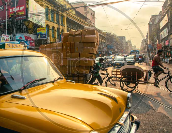 YELLOW TAXIS ON THE STREETS OF KOLKATA, WEST BENGAL.