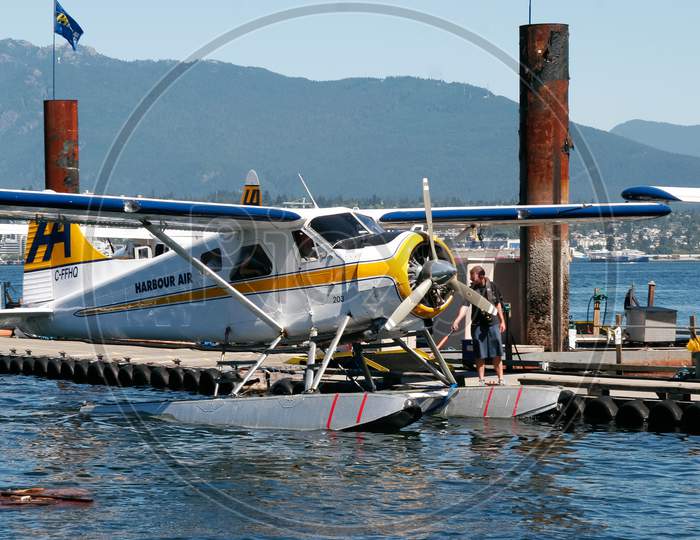 Vancouver, British Columbia, Canada - August 14 : Seaplane Moored At The Seaplane Airport In Vancouver On August 14, 2007. One Unidentified Man