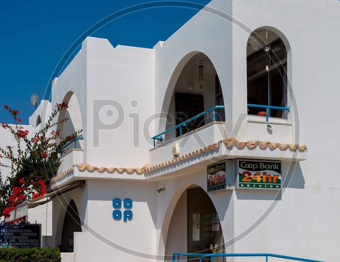 Pissouri, Cyprus, Greece - July 20 : View Of The Co-Op Bank In Pissouri, Cyprus On July 20, 2009