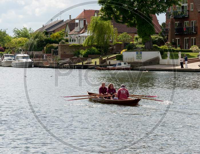 Rowing On The River Thames Between Hampton Court And Richmond