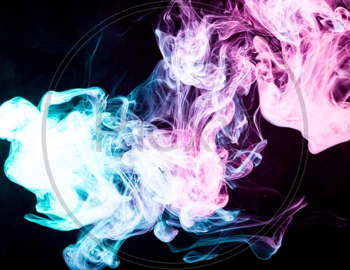 Art For Your Design Project. Transparent Creativity. Abstract Art Colored Smoke On Black Isolated Background. Stop The Movement Of Multicolored Smoke On Dark Background