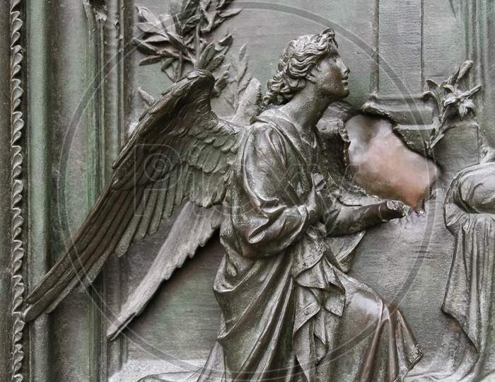 Detail Of The Main Door At The Duomo Cathedral In Milan