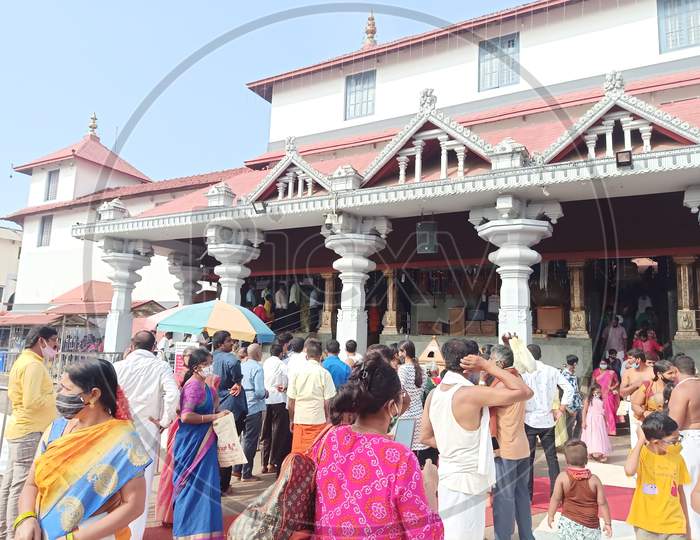 Unidentified people in front of Sri Manjunatha Temple, Daramasthala temple, Shiva temple, Maha Shivratri, Daramasthala, Karnataka, India
