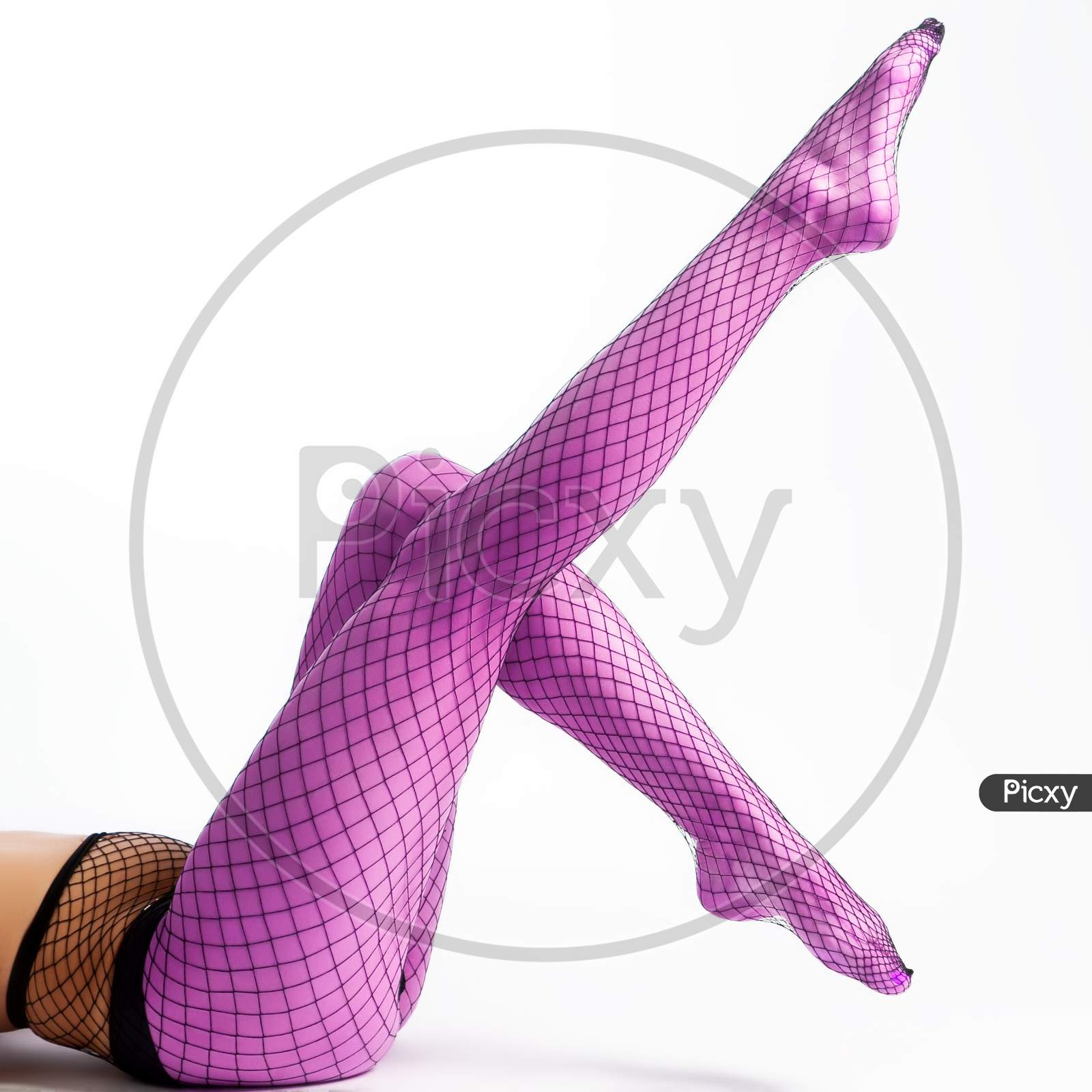 Image of Close-Up Of Slim Legs Of A Beautiful Woman In Nylon Purple ...
