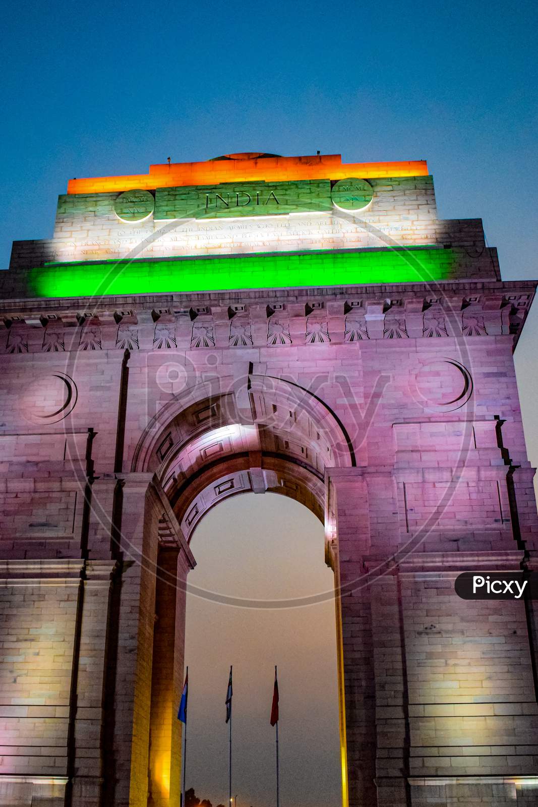 Evening View Of India Gate In Delhi India, India Gate View With Tri Colour At The Top, India Gate Architecture Full View During Evening Time