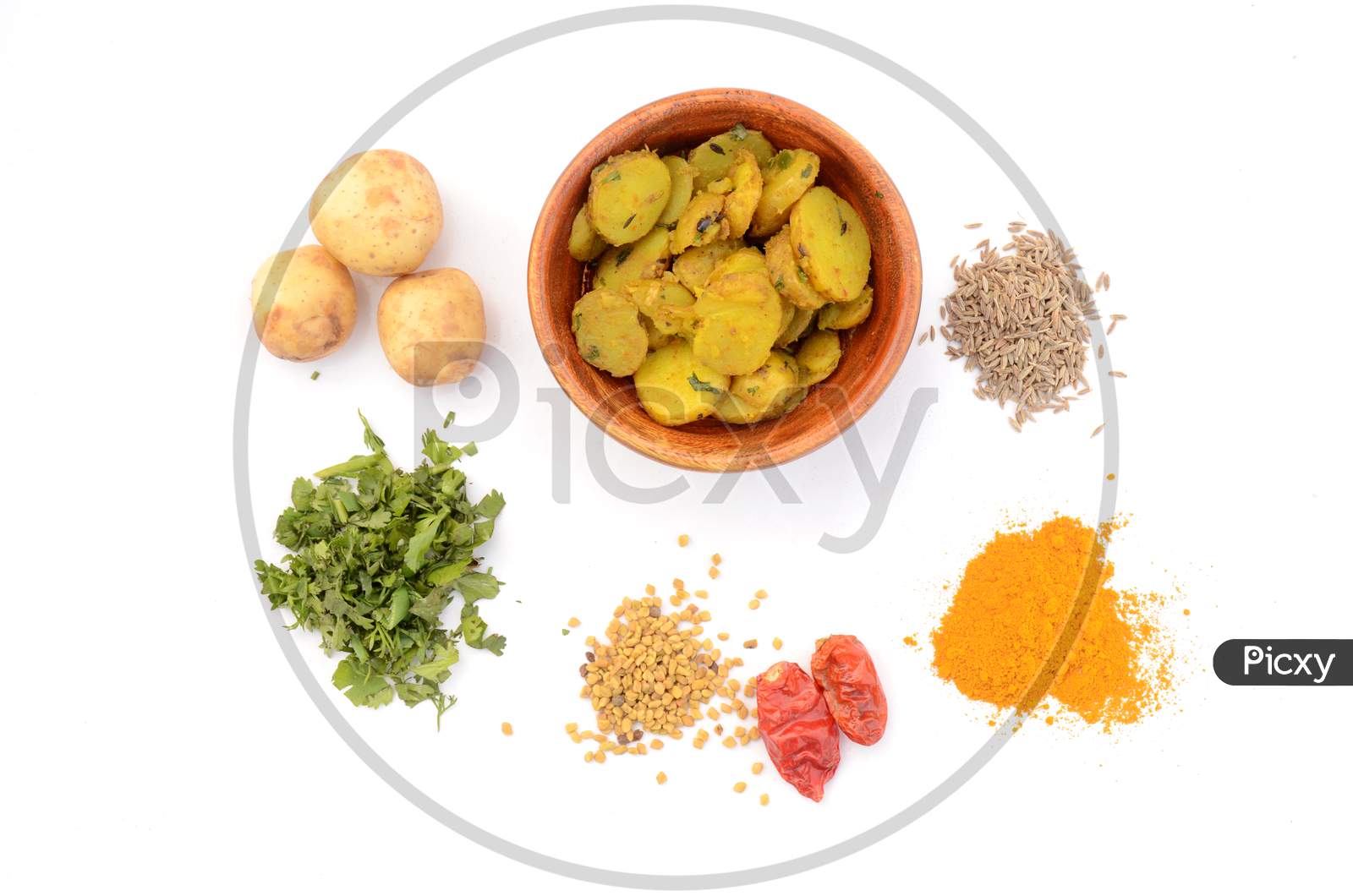 Potato Vegetable Made For With Potato, Coriander, Anise, Turmeric, Chilly, Greek, Isolated On White Background.