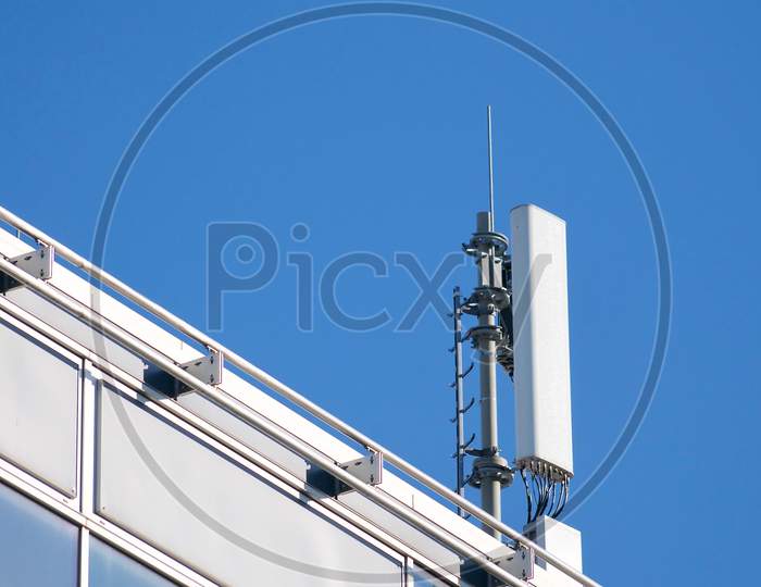 Telecommunication Antenna Of 4G And 5G Network On A Building In Switzerland