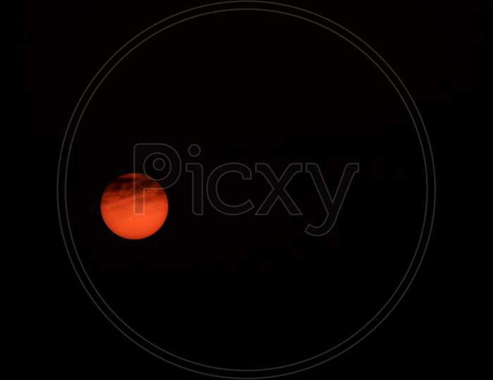 Beautiful Picture Of Orange Full Sun Isolated On Black Background. Selective Focus On Subject