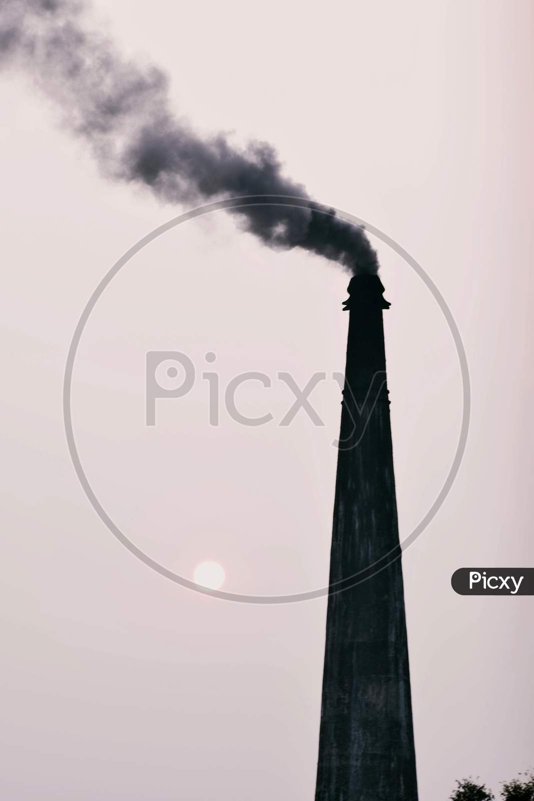Beautiful Picture Of Chimney And Smoke Comes Out From It. Isolated On White. Selective Focus
