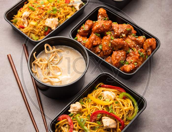 Home Delivery Of Indian Chinese Food In Plastic Boxes In Group