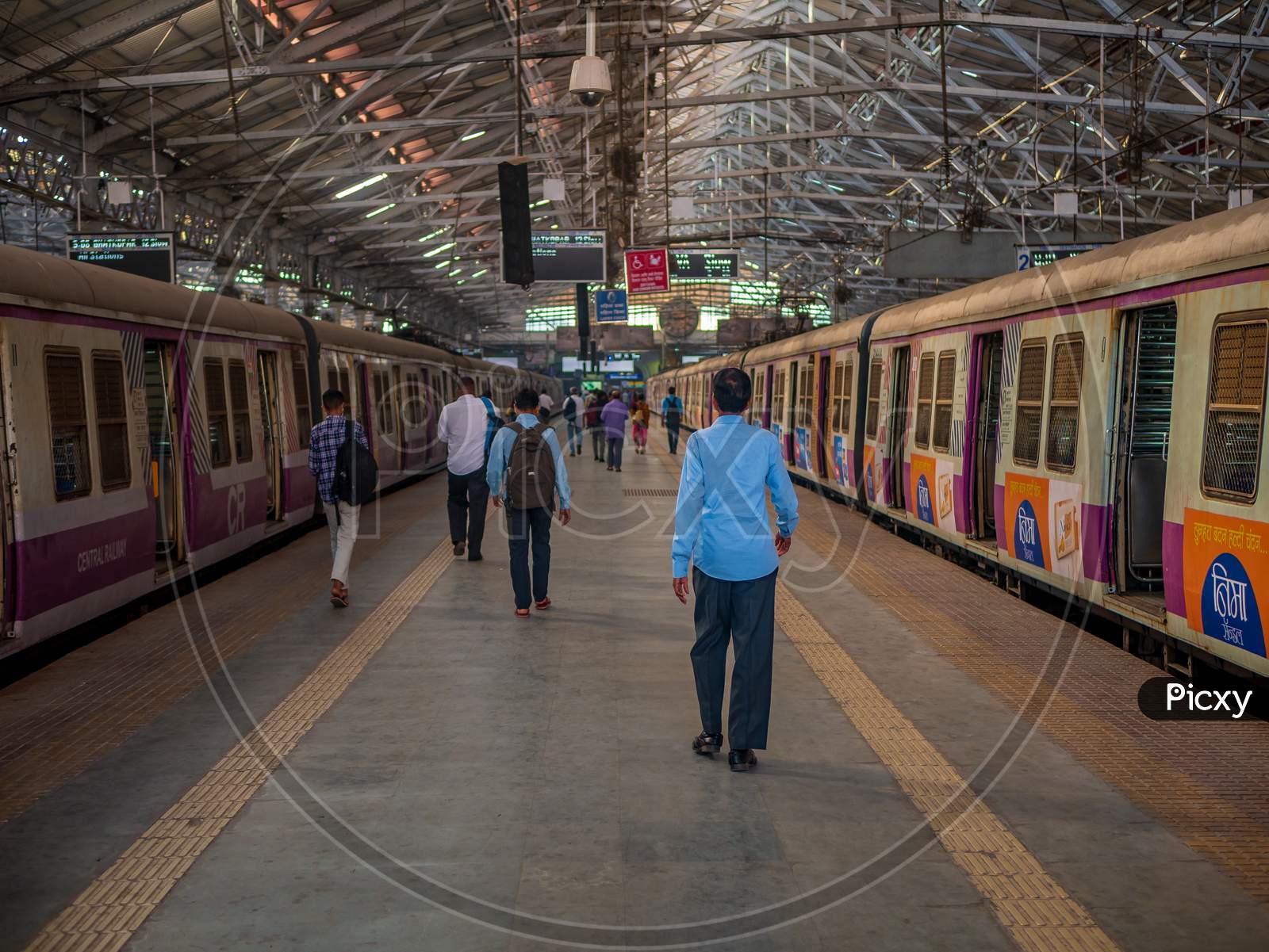 Commuters Walking Inside Chhatrapati Shivaji Terminus Railway Station, A Historic Railway Station And A Unesco World Heritage Site In Mumbai, Maharashtra, India