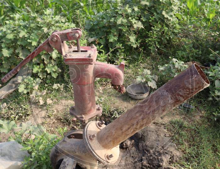 Water Pump Closeup On Paddy Firm