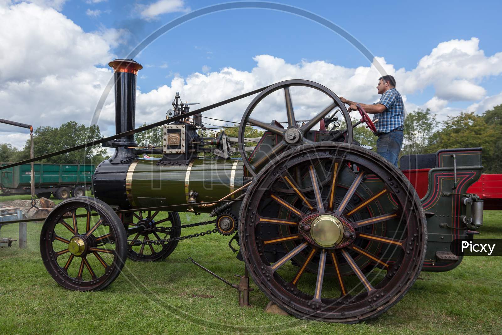 Rudgwick, Sussex/Uk - August 27 : Traction Engine At Rudgwick Steam Fair In Rudgwick Sussex On August 27, 2011. Unidentified Man.