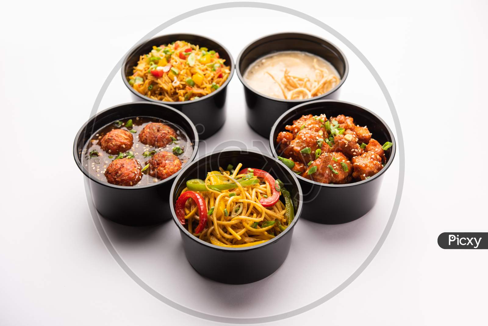 Home Delivery Of Indian Chinese Food In Plastic Boxes In Group