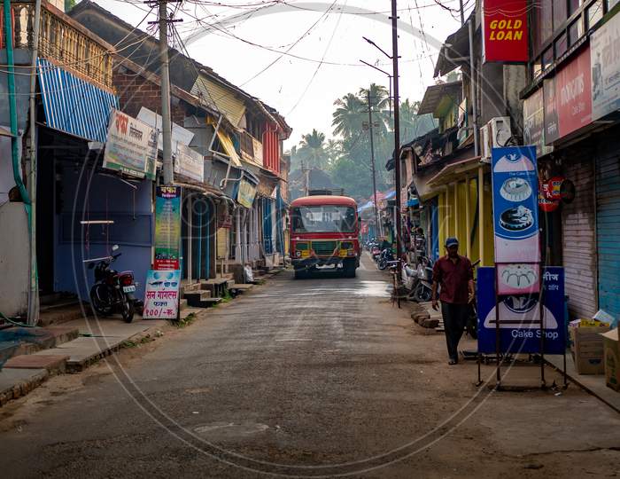 Local Public Transport Bus Running On A Small Street Of A Village In Maharashtra