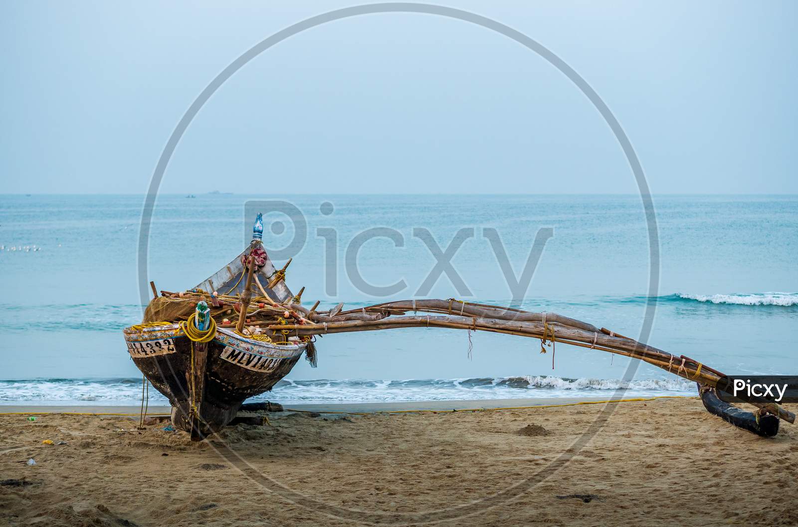 Traditional Indian Fishing Boat At The Beach Of Maharashtra