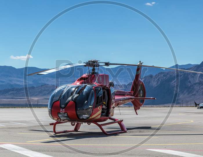Boulder City, Nevada, Usa - August 1 : Red Helicopter Parked On The Airfiled At Boulder City, Nevada On August 1, 2011