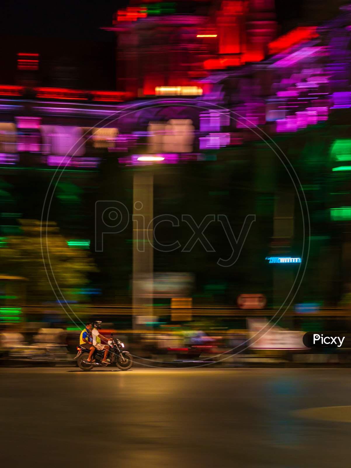 Unidentifed Man Riding A Bike With Pillion Near Cst Station At South Mumbai
