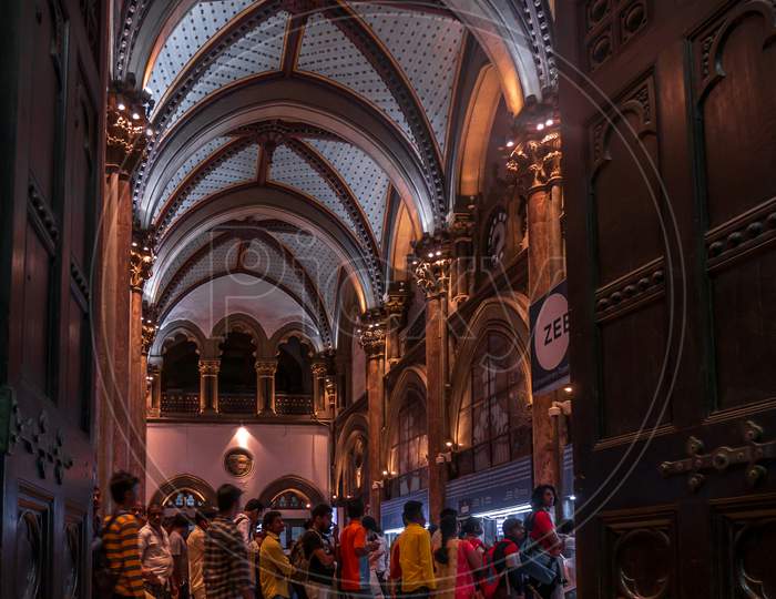 Unidentified Passengers Standing In Queue At Cst Railway Station