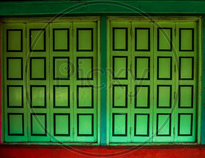 Green Colored Wooden Shop Door