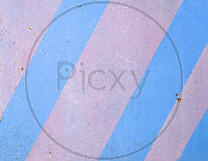 Gray Wall With Blue Diagonal Stripes, Texture Grunge Background. Geometric Colorful Wall