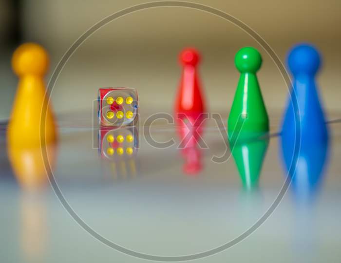 Reflection Of Colorful Plastic Player Pawn