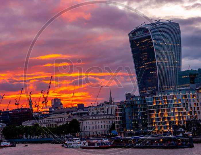 City Of London One Of The Leading Centres Of Global Finance. Canary Wharf During Sunset.