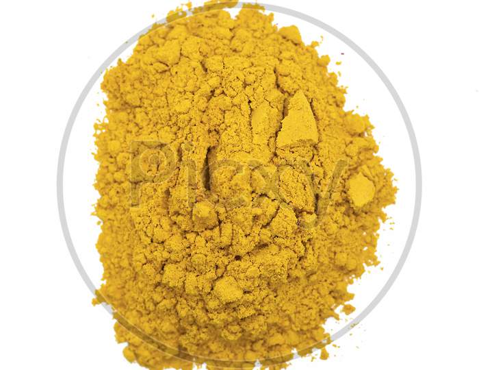 Piles Of Yellow Color Powder For Indian Holi Festival On White Background.