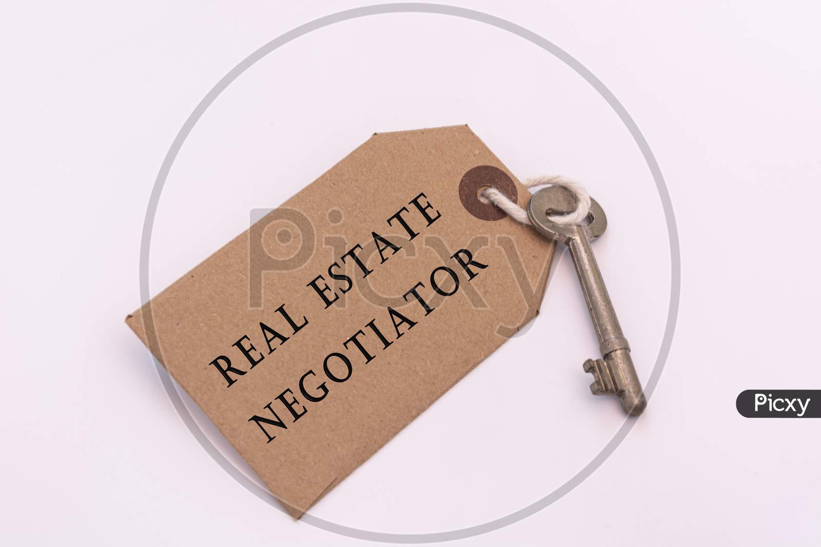 Text On A Tag With Key - Real Estate Negotiator