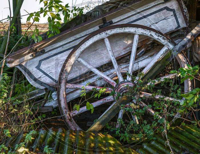 Old Wooden Cart In A Derelict Barn