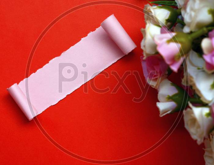Torn Paper With Flowers And Heart Shape Clothespin On Red Background. Valentine'S Day Concept. Use For Text
