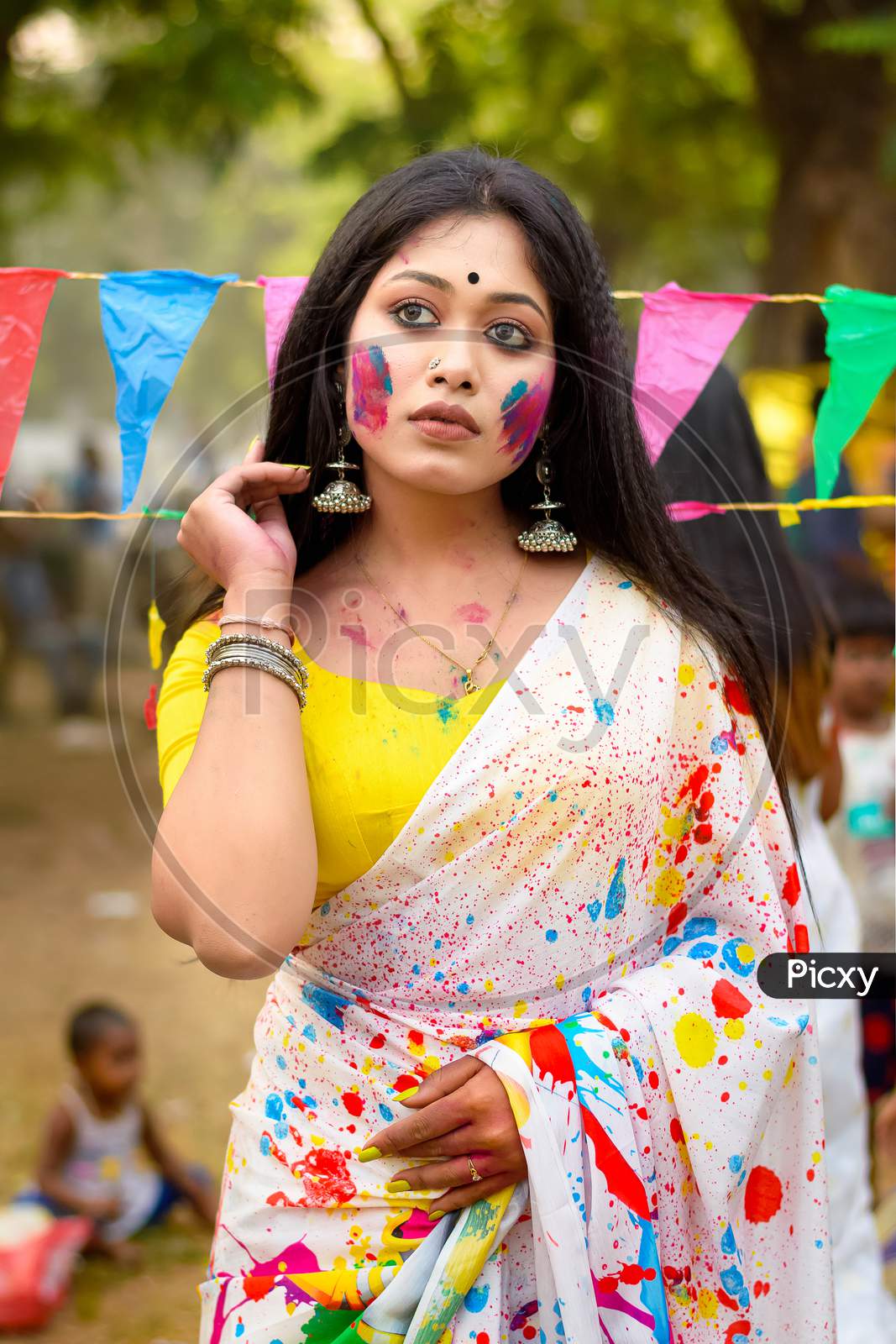 Image of Portrait Of Beautiful Happy Young Indian Woman With Spring Festive  Make Up Celebrating Holi With Powder Colours In Kolkata On March  2021-IA673721-Picxy