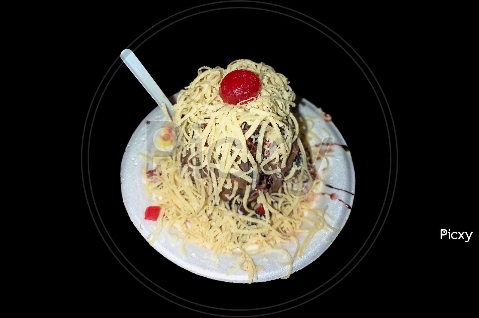 Indian Ice Gola dish in black background.